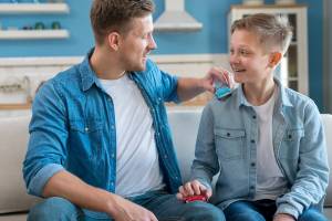 father-son-playing-with-toy-cars_23-2148511206